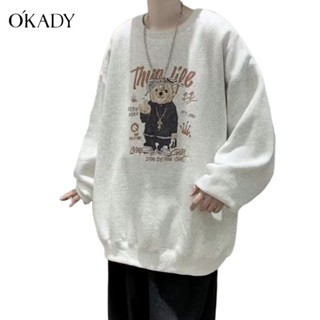 OKADY ผู้ชายรอบคอ hoodie ฤดูใบไม้ร่วงเวอร์ชั่นเกาหลีแบรนด์ Tip หมีพิมพ์เสื้อกันหนาวเสื้อสบาย ๆ หลวม