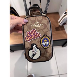 (ผ่อน0%) กระเป๋าสะพายข้างใส่โทรศัพท์ Coach Disney X Coach Eva Phone Crossbody In Signature Canvas CC761 ลายซีสีน้ำตาล