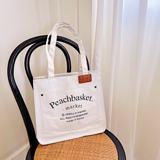 [ ทักแชทสอบถามสต๊อคก่อนกดสั่งซื้อ! ] — * Peachbasket tote bag 🧺 กระเป๋าผ้าแคนวาสสไตล์มินิมอลใส่คอมใส่ ipad ได้