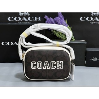 🤩กระเป๋าสะพายรุ่นใหม่NEW COACH Mini Jamie Camera Bag In Signature Canvas With Varsity Motif