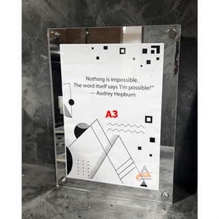 กรอบรูปอะคริลิคติดผนัง A3 พร้อมหมุดลอย (มิลเลอร์สีเงิน)