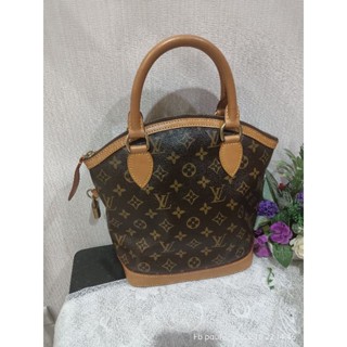 Louis Vuitton monogram canvas Lockit year06 used bag like new good condition good price