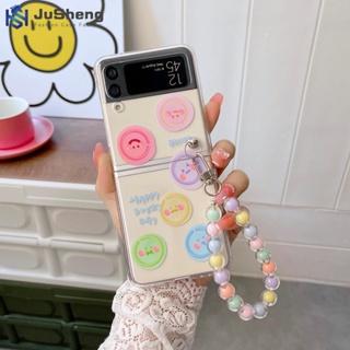 Jusheng เคสโทรศัพท์มือถือ PC แข็ง ลายหน้ายิ้ม แต่งกลิตเตอร์ พร้อมสายคล้องข้อมือ แฟชั่น สําหรับ Samsung Z Flip4 Z Flip3