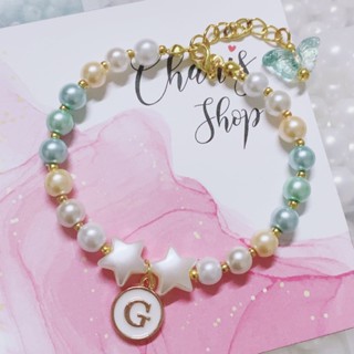 สร้อยข้อมือดาวน้อย สีเขียวเหนี่ยวทรัพย์ สายมูห้ามพลาดเลยนะ พร้อมจี้อักษร แจ้งทางแชทจ้า | Chanis store