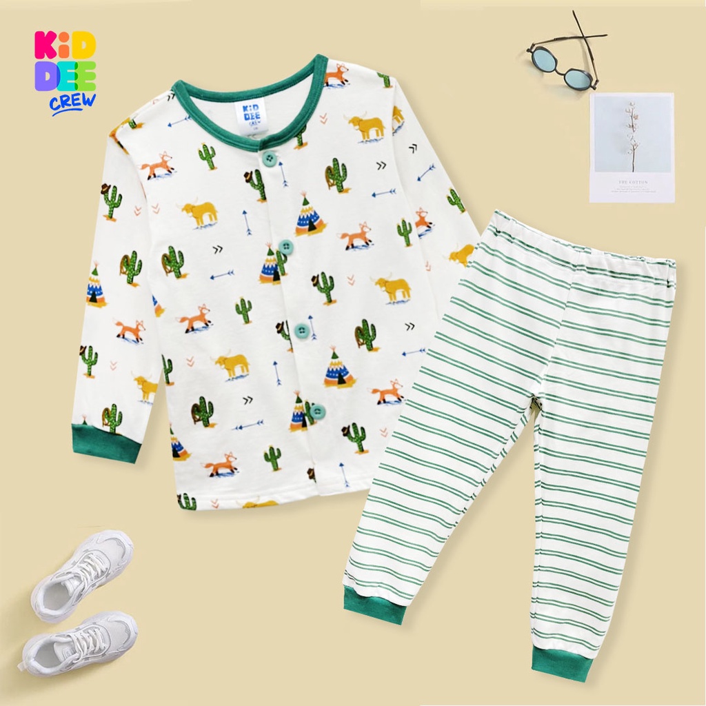 KiddeeCrew ชุดนอนเด็กสีครีมขาวลายลักบิ้ เหมาะสำหรับอายุ 1-12 ปี