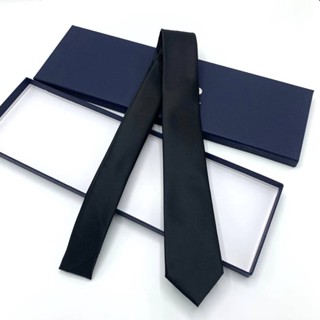 CHRISTIAN DIOR SIGNATURE LOGO NECKTIE IN BLACK เนคไท แบรนด์คริสเตียนดิออร์ ปักตัวหนังสือโลโก้ ฟ้อนท์ลายเซ็นต์ สีดำ