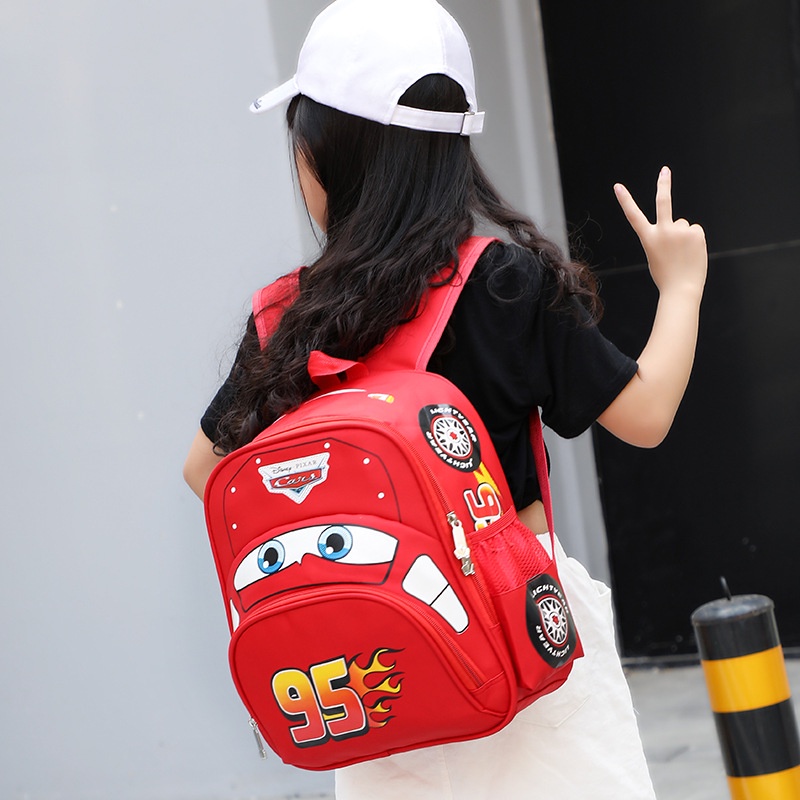 การ์ตูนรถยนต์ Lightning Mcqueen กระเป๋าเป้สะพายหลังการ์ตูนรถรูปร่างกระเป๋านักเรียนเด็ก