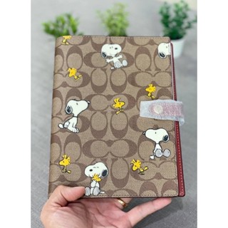 พร้อมส่ง 💯🇺🇸 สมุดโน๊ต Coach X Peanuts Notebook In Signature Canvas With Snoopy Woodstock Print