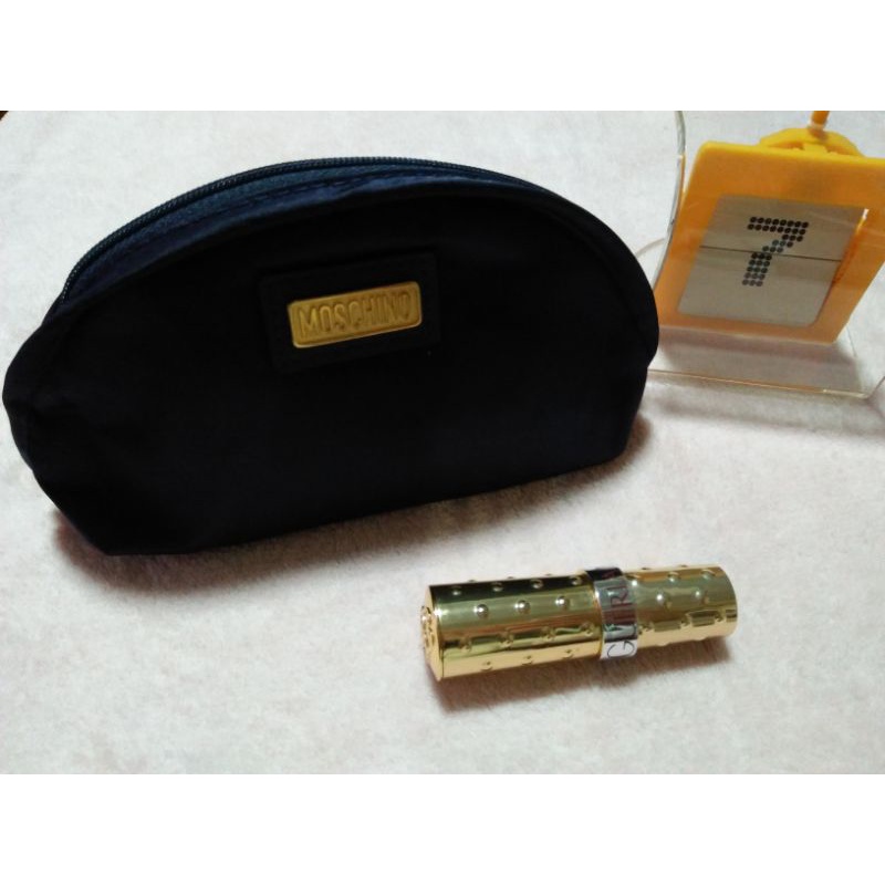กระเป๋าเครื่องสำอางค์สีน้ำเงินmoschino