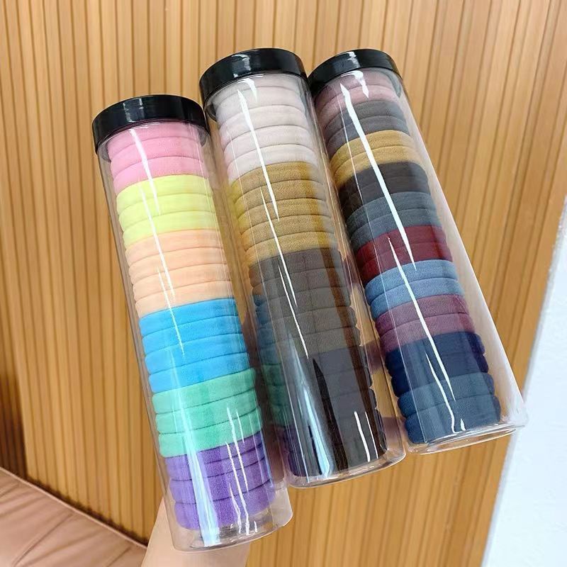 PREMIUM KINGS - F5588 HAIR TIE IN TUBE PACKAGING CONTAINS 20 ชิ้น / นําเข้า COLORFUL PLAIN HAIR TIE 