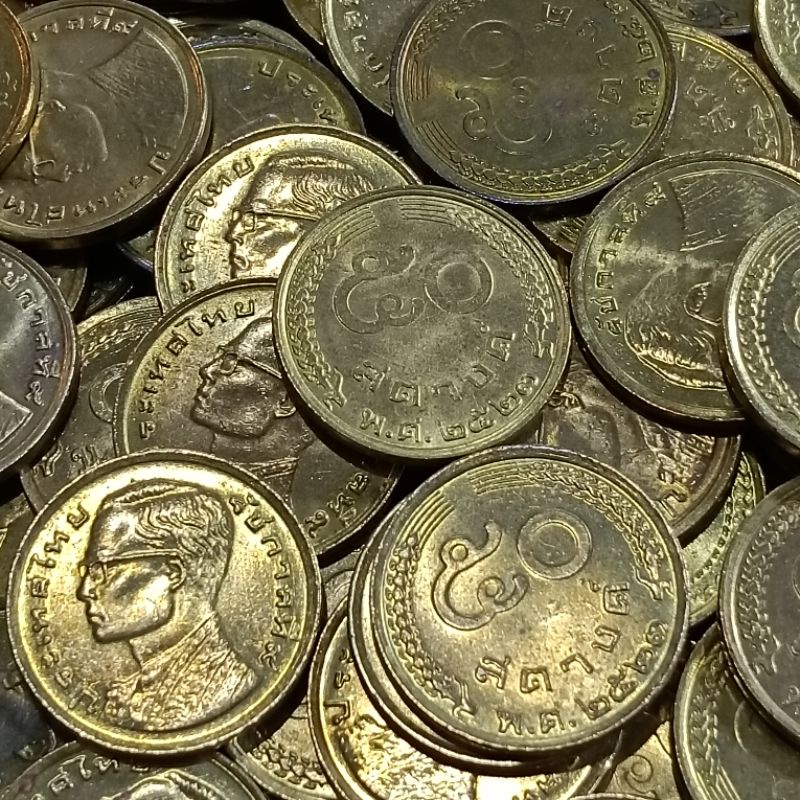 เหรียญ 50 สตางค์ รวงข้าว ปี 2523 รัชกาลที่ 9สภาพ : เหรียญใหม่ ไม่ผ่านการใช้งาน เก่าเก็บ  ใส่ตลับกันรอย