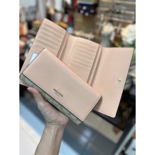 กระเป๋าสตางค์ COACH C5966 Slim Trifold Wallet In Signature Canvas