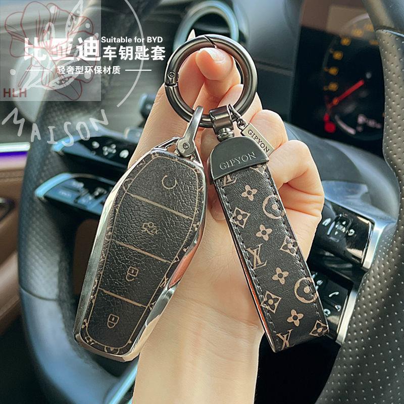 เหมาะสำหรับชุดคีย์ BYD ใหม่ Qin Song Yuan PLUS กระเป๋าหญิง Tang Han Yuan Qin Song Pro ปลาโลมา e3e9 ร