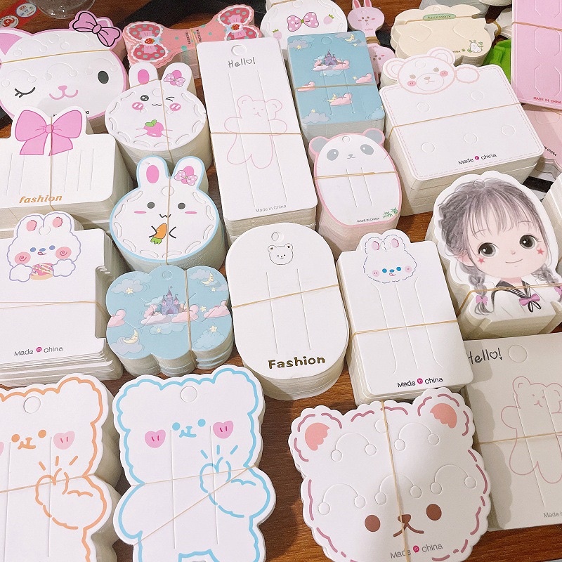 🐻พร้อมส่ง🐻แผงกระดาษ แผงกิ๊บ แป้นยางรัดผม แป้นกระดาษติดกิ๊บ 50 แผ่น