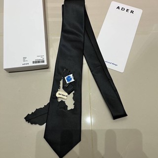 ADER ERROR BURNT CINDER HOLE DISTRESSED-EFFECT SILK TIE BLACK เนคไท แบรนด์เอเดอร์ เออเรอร์ เกาหลี สีดำ รูไหม้