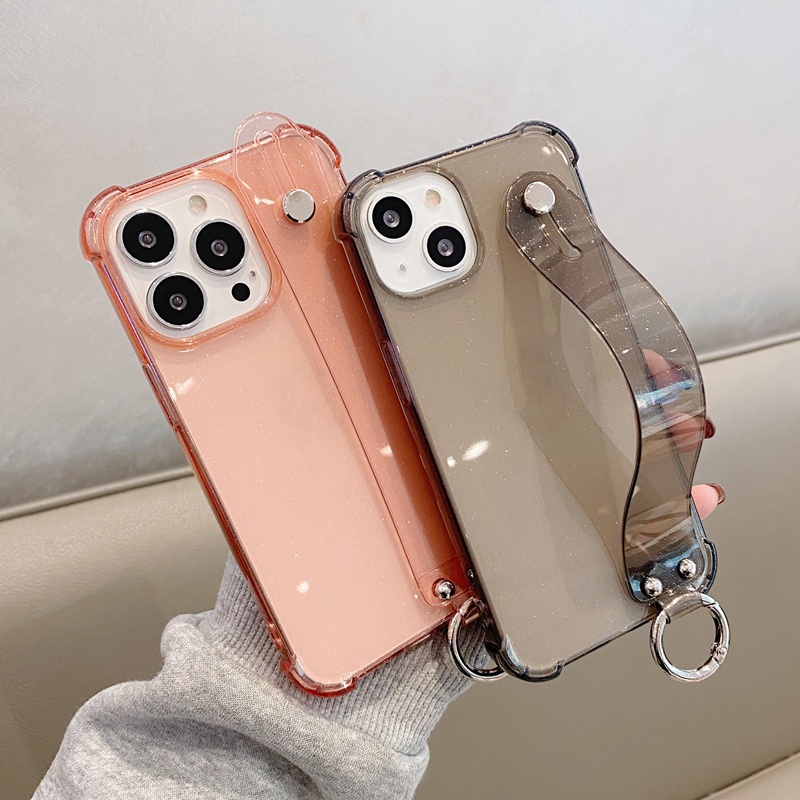 Glitter โปร่งใสนุ่มกันกระแทก iPhone กรณีสายรัดข้อมือ Anti-fall ถุงลมนิรภัยสําหรับ iPhone 17 16 15 14 13 12 11 Pro MAX XS 7 8 Plus + SE 2020 ฝาครอบโทรศัพท์ใส ราคา ถูกที่สุด ดีลบีเคเค