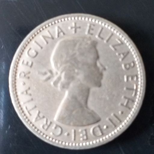 1955 Queen Elizabeth II English 2 shillings (Florin) One of the $25 million that was canceled in 197