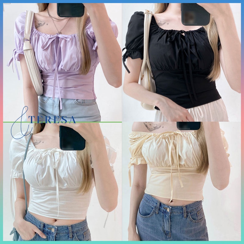 เสื้อครอปเอวลอย เเขนตุ๊กตาผูกโบว์ เสื้อแฟชั่นเกาหลี เลื้อผ้าผู้หญิง สม็อกผ้าลื่น + ฝ้าย