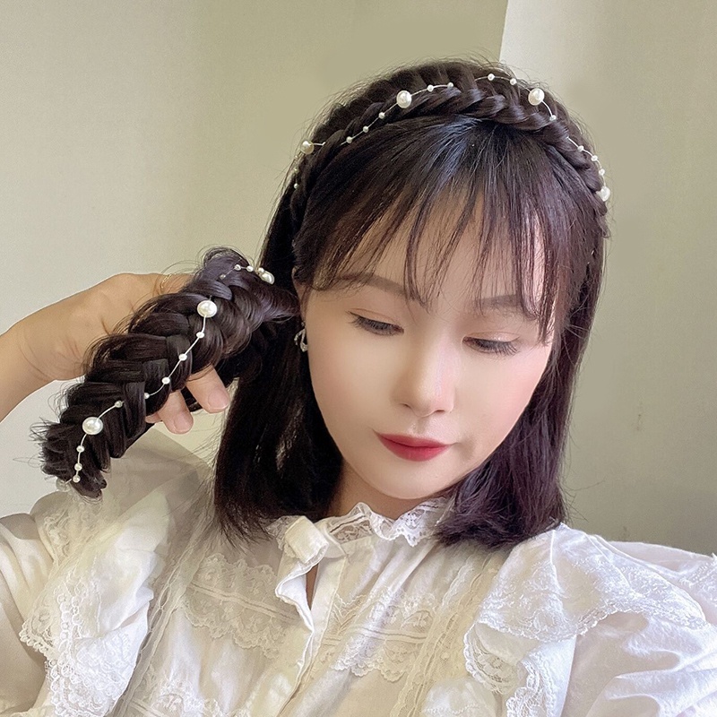 สาวหวานน่ารัก ปีกกว้างบิดถักเปียวิกผมที่คาดผมมุกกันลื่นก้างปลาถักเปียผมจัดแต่งทรงผมเครื่องมือ
