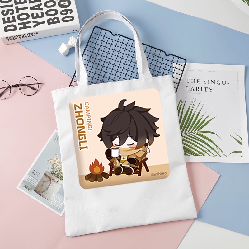กระเป๋าผ้าแคนวาสสีดําและสีขาวพิมพ์ลาย GENSHIN IMPACT ver CAMPING chibi อะนิเมะเกมกระเป๋าสะพายไหล่สะด