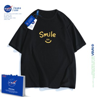 เสื้อยืดแขนสั้นลําลอง ผ้าฝ้าย ทรงหลวม พิมพ์ลายหน้ายิ้ม NASA แบบเรียบง่าย แฟชั่นสําหรับผู้ชาย และผู้หญิง