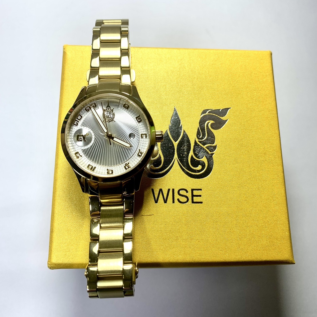 นาฬิกาเฉลิมพระเกียรติรัชกาลที่9ครองราชย์สมบัติ70ปีแบรนด์ Wiseนาฬิกาข้อมือผู้หญิงเรือนทองสวยหรูมือสองสภาพดีเยี่ยมเดินปกติ