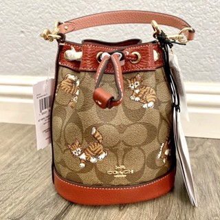 COACH Mini Dempsey Bucket Bag In Signature Canvas With Dancing Kitten Pr CC431