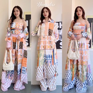 ชุดเซต 3 ชิ้นเชิ้ตแขนยาวกระดุมหน้าตัวยาวผ่าข้างสูง มาพร้อมกางเกงเอวสูงขายาว มีกระเป๋าข้างมีเกาะอกยางยืดสม้อคเข้าชุด