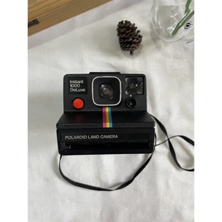 Polaroid land camera instant 1000 DeLuxe กล้องโพลาลอยด์ โพลาลอยด์คาดรุ้ง กล้องฟิล์ม