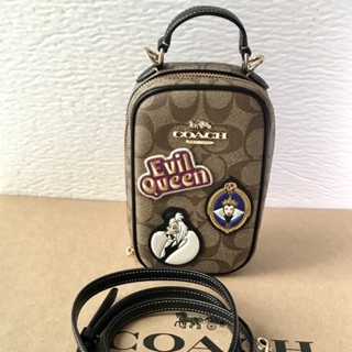 CC761 Disney X Coach Eva Phone Crossbody in Signature Canvas with Patches