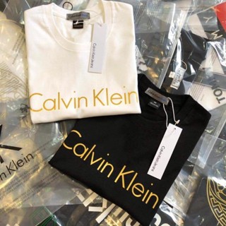 เสื้อยืดแขนสั้นลําลอง พิมพ์ลาย CALV1N สีบรอนซ์ แฟชั่นคู่รัก สําหรับผู้ชาย และผู้หญิง