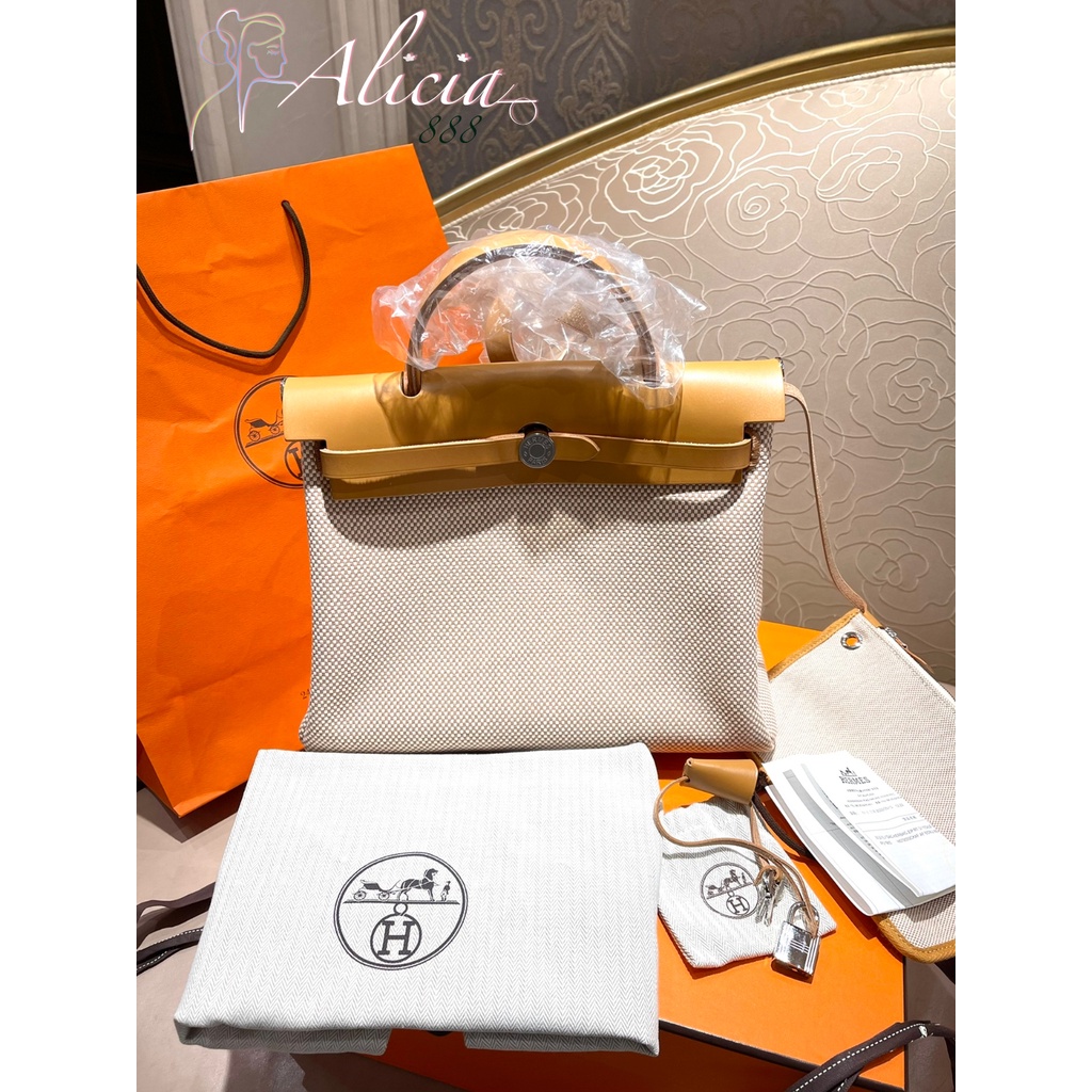 Hermes herbag zip 31 Retourne Bag in 01 White canvas and 2S Sesame Hunter Cowhide leather PHW STAMP U