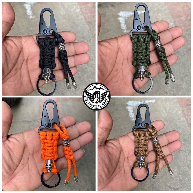 พวงกุญแจถักเชือกparacord 4 mm. ตะขอเกี่ยวหัวโลหะอย่างดี มีจี้หัวกระโหลก มีหลายสีให้เลือก