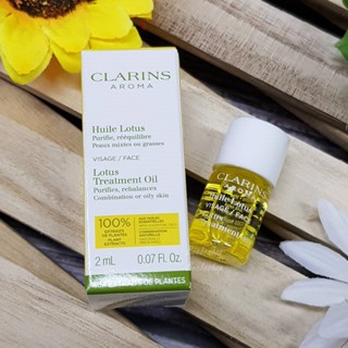 Clarins Lotus Face Treatment Oil 2ml New Package 03/2022 ออยล์บำรุงผิวสำหรับผิวผสมถึงผิวมัน กระชับรูขุมขน