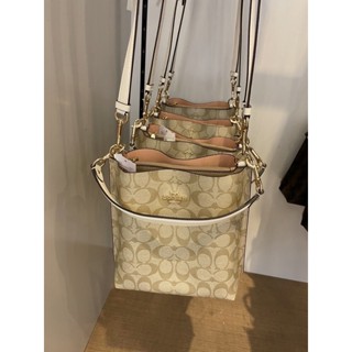 ❤️พร้อมส่ง🇺🇸ของแท้💯USA COACH  SMALL TOWN BUCKET BAG WITH HEART PETAL PRINT