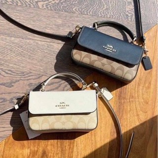 Coach MINI JOSIE TOP HANDLE CROSSBODY IN BLOCKED SIGNATURE CANVAS