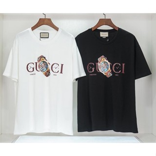 Gucc เสื้อยืดแขนสั้น ผ้าฝ้าย พิมพ์ลาย แฟชั่นสําหรับผู้ชาย และผู้หญิง