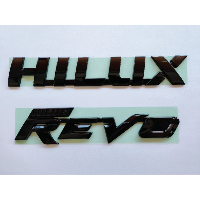 พร้อมส่ง!! (ของแท้) สติ๊กเกอร์ โลโก้ HILUX สีดำ REVO สีดำ รุ่นพิเศษจากโตโยต้า ของแท้ แน่นอน100% เบิกศูนย์ TOYOTA