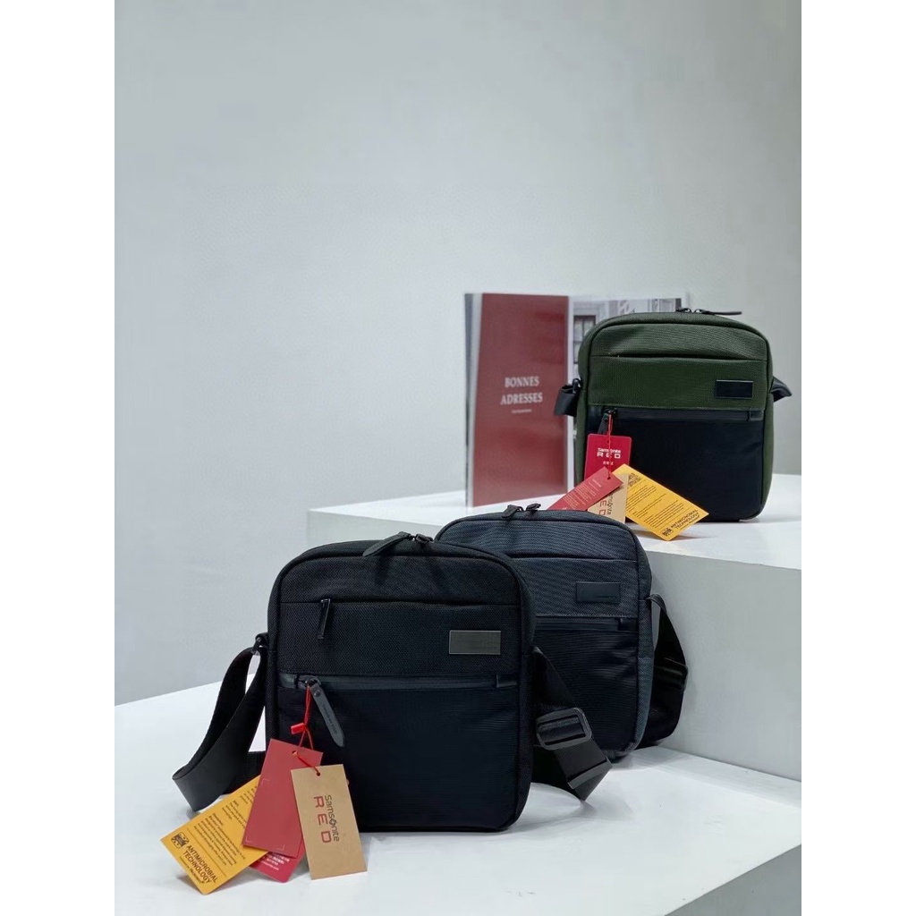 Samsonite สีแดง BLUNTES CROSS HY9 Samsonite ไนลอนกันน้ํา Casual Commuter ผู้ชายกระเป๋าสะพายขนาดเล็กก