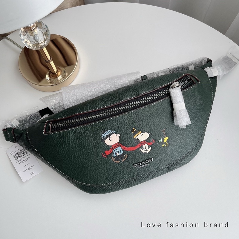 👑ผ่อน0%~แท้100%👑 คาดอก สีเขียว Coach X Peanuts Warren Belt Bag With Snoopy Motif CE618