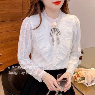 เสื้อแขนยาวแต่งริ้วระบายซ้าย-ขวา มาพร้อมเข็มกลัด