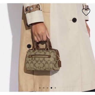 กระเป๋าทรงหมอนจิ๋ว👜สีน้ำตาล💕NEW  COACH MINI ROWAN CROSSBODY IN SIGNATURE CANVAS