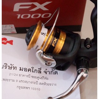 รอกตกปลา Shimano รุ่น  FX 2500 มีใบรับประกันบริษัท มอคโกลี่  จำกัด