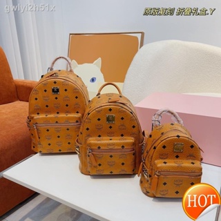 ▤♞【Free Shipping】Cowhide M CM Stark Visetos Double side rivets Backpack women Leather Classic old flower school bag