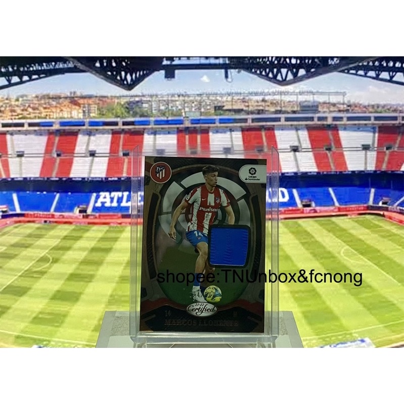 การ์ดชิ้นส่วนเสื้อนักฟุตบอล 2021-22 Panini Chronicles - Marcos Llorente /500 Match Worn