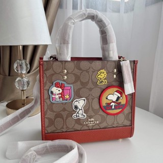 Coach CE851 Coach X Peanuts Dempsey Tote 22 In Signature Canvas With Patches