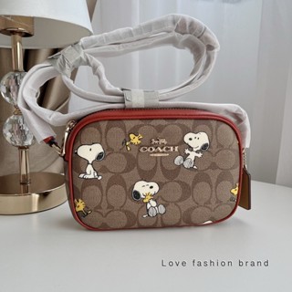 👑ผ่อน0%~แท้100%👑 CF248 กระเป๋าสะพาย Coach X Peanuts Mini Jamie Camera Bag In Signature Canvas With Snoopy Woodstoc