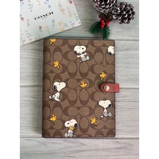 หายาก COACH X PEANUTS NOTEBOOK IN SIGNATURE CANVAS WITH SNOOPY WOODSTOCK PRINT