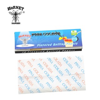 กระดาษโรล Hornet กลิ่นพีน่าโคลาด้า 78 มม 50 แผ่น/ตลับ 🌿 Hornet Pina Colada Flavored Rolling Papers 78mm 50 Leaves