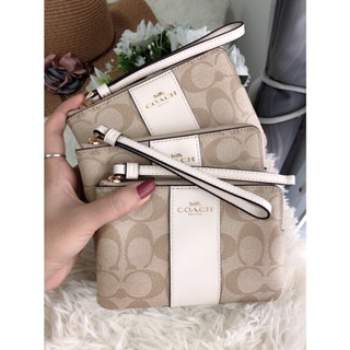 (ส่งฟรี) COACH WRISTLET กระเป๋าคล้องมือ กระเป๋าคล้องแขน ไซส์S 1 ซิป ลาย Signature ขนาด 6x4 นิ้ว